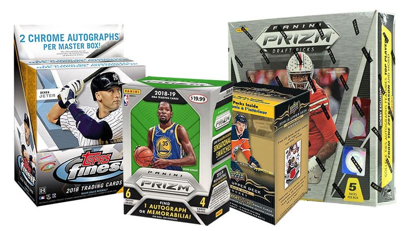 Assorted sports trading card boxes featuring baseball, basketball, hockey, and football stars.